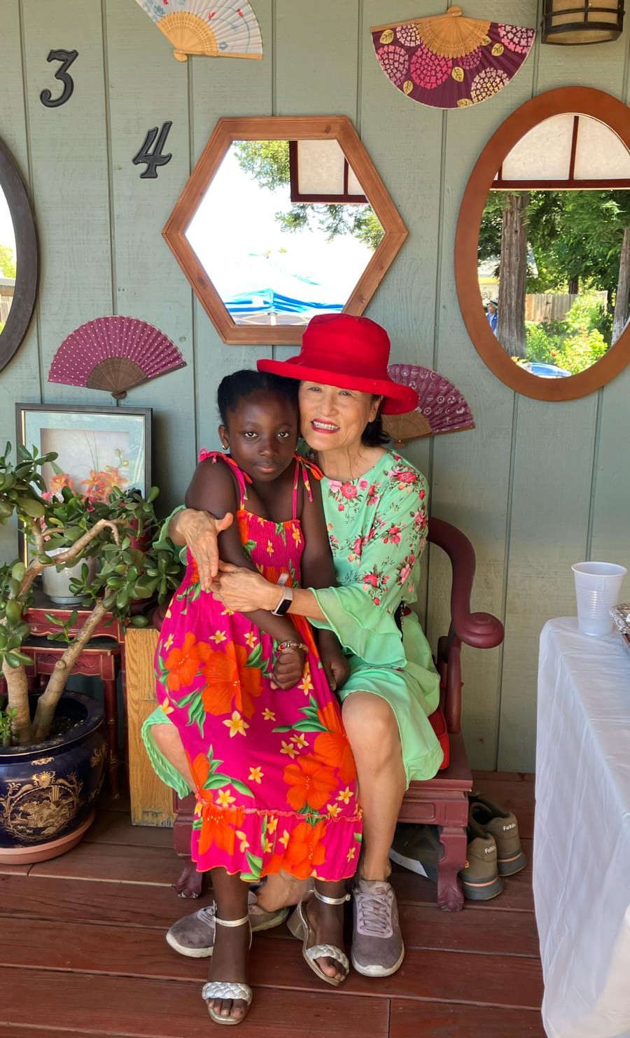 Huei with young visitor