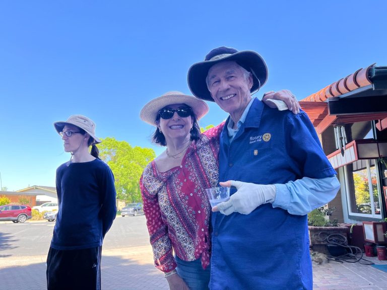 Visitors relaxing on bench