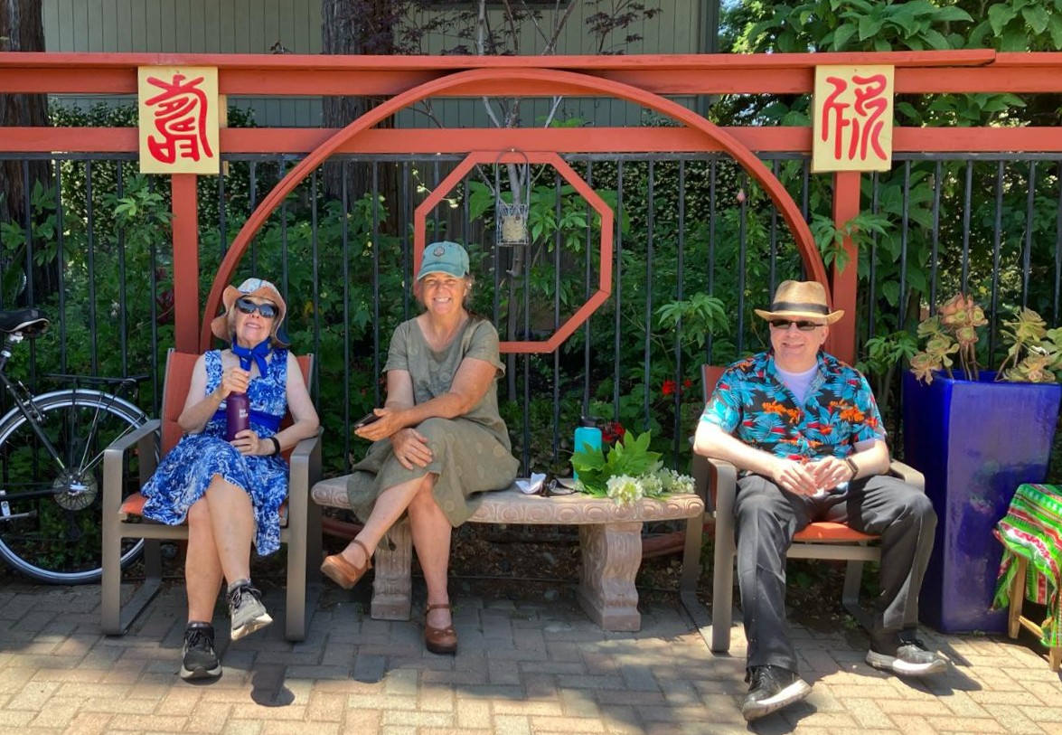 Visitors relaxing on bench
