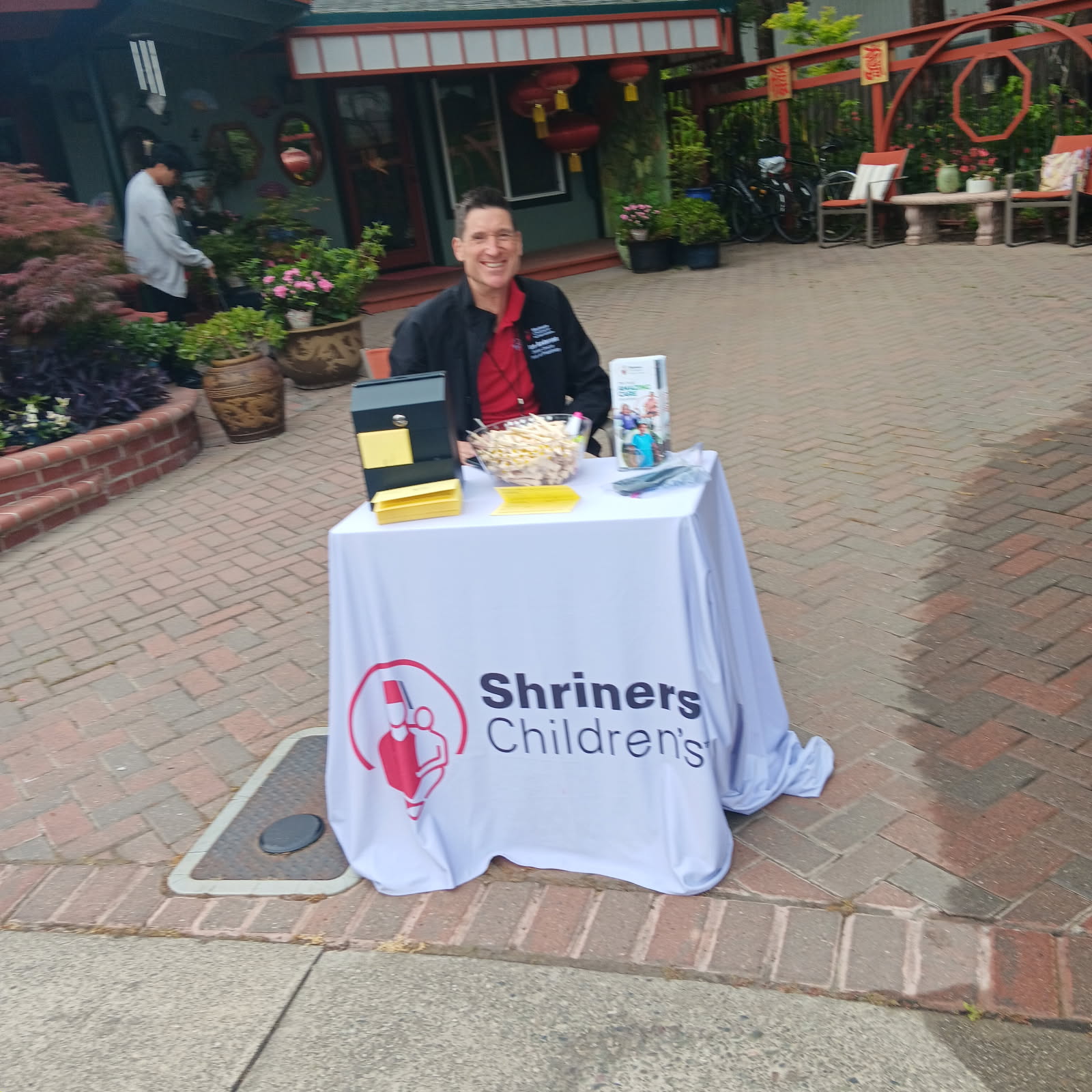 Volunteer at the welcome table