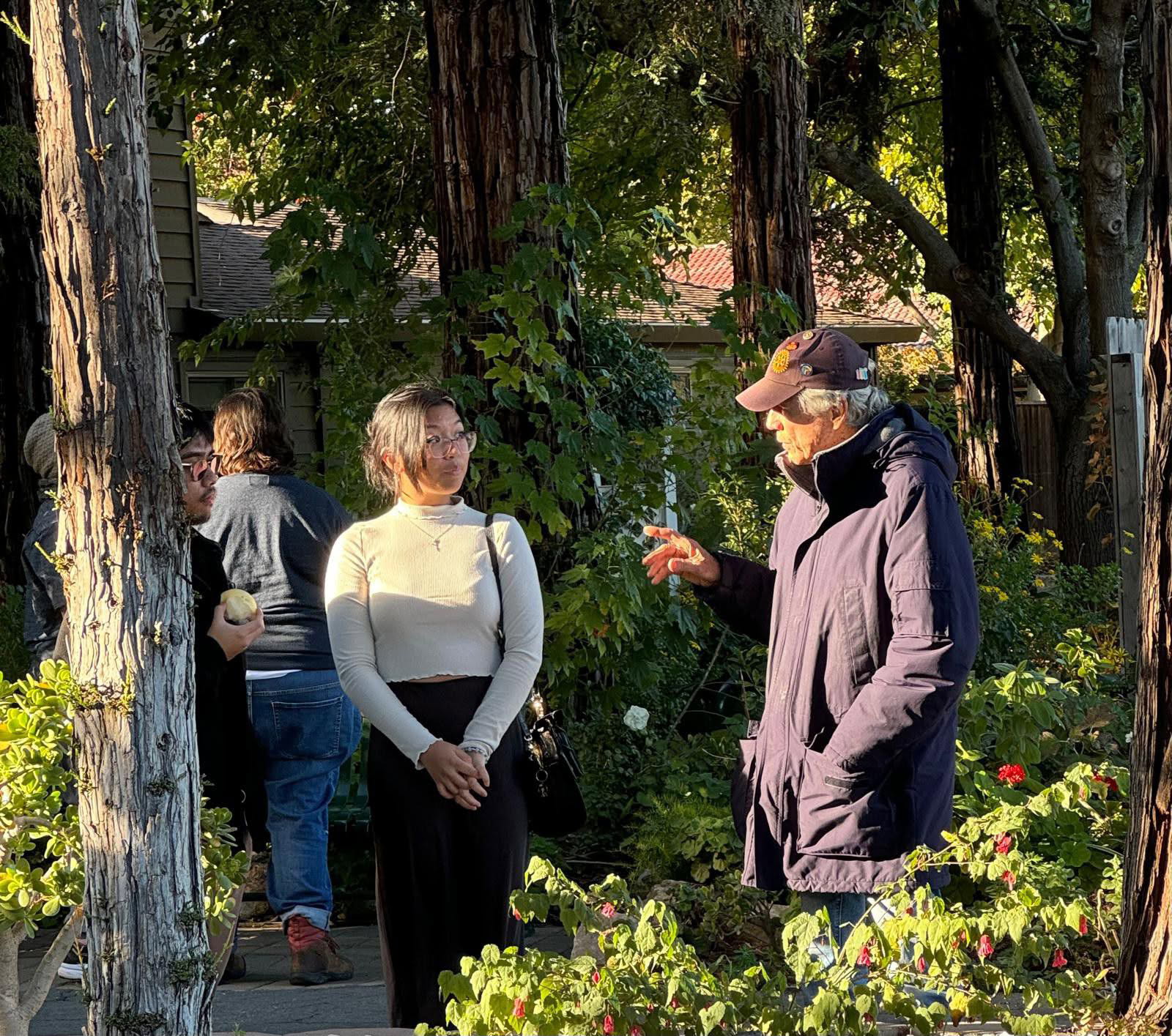 Volunteer speaking with a guest